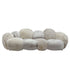 Curvae Sofa Lush Beige van PTMD, bolle bank in lichte hoogpolige stof op witte achtergrond