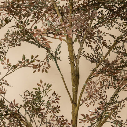 Groene kunstboom van PTMD als accent naast een kast